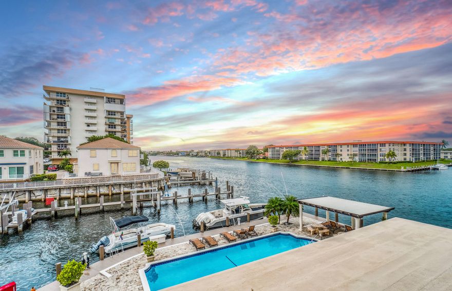 RENOVATED BUILDING - Live the resort lifestyle on your own island in prestigious Hillsboro Beach's Millionaire Mile. This beautifully updated, bright southeast corner residence is offered fully furnished for immediate enjoyment. Unit 201 features a spacious wraparound balcony with Intracoastal and pool views, double en suites, impact windows, tile floors, newer A/C & newer appliances. The building has completed its 50-year certification & extensive renovations at seller's expense, including full concrete restoration, reconstructed balconies, a new roof & fresh paint. Enjoy a heated pool overlooking the water, private beach access, fitness center, clubhouse, waterfront BBQ area, covered parking, only 7 units per floor & dockage for up to a 42-foot boat with no fixed bridges, when available.