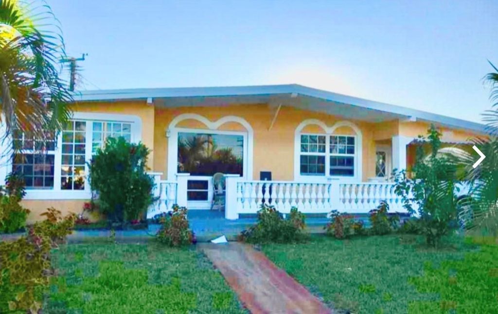 Photo of 1430 NE 41st Dr, Pompano Beach, FL 33064 (MLS # F10538303)