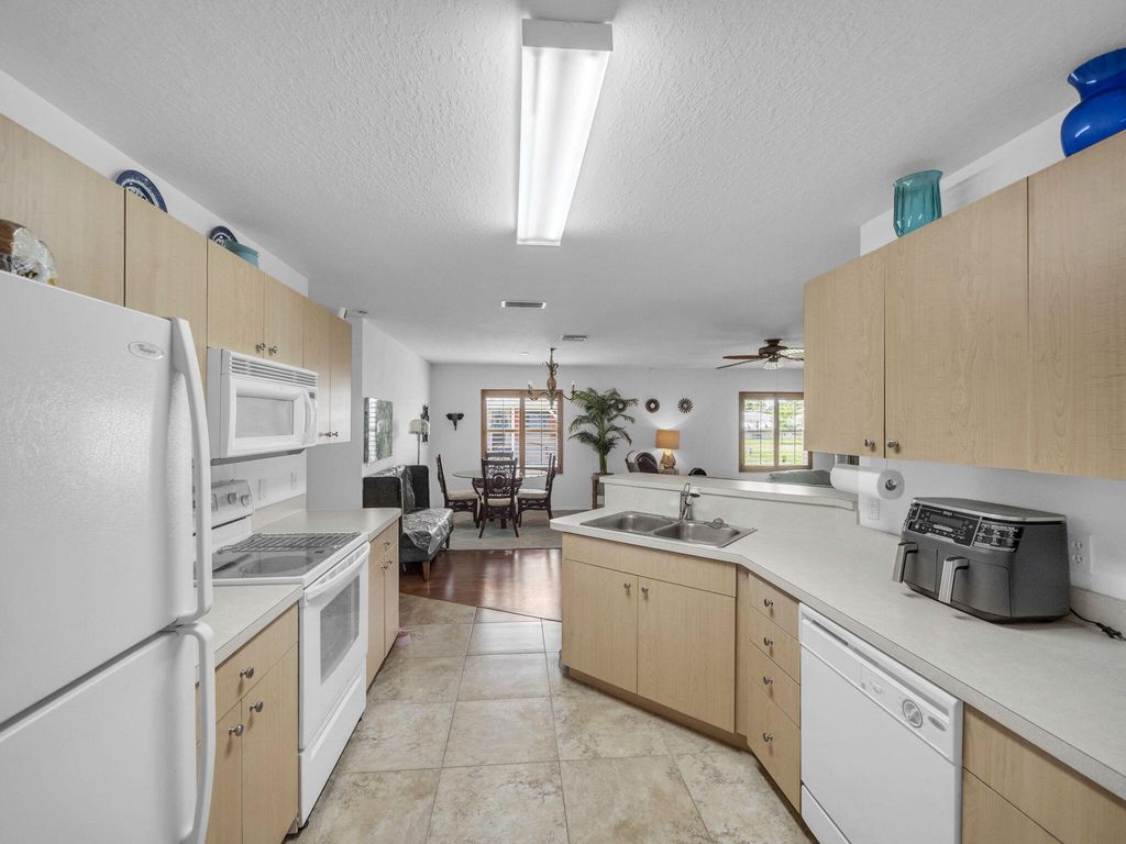 Photo of 73 Golf Drive, Port Saint Lucie, FL 34952 (MLS # R11113567)