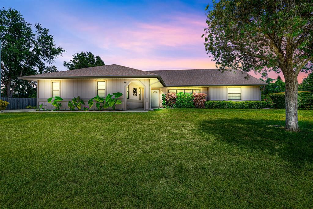 Photo of 2049 SE Hanford Road, Port Saint Lucie, FL 34952 (MLS # R10732345)