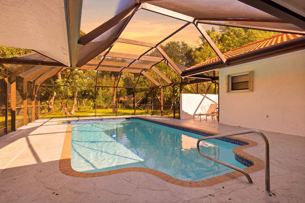 Photo of 8899 NW 47th Drive, Coral Springs, FL 33067 (MLS # B26040945)