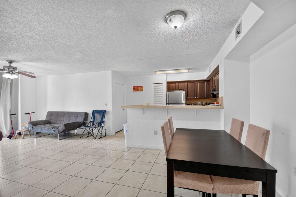 Photo of 1733 Village Boulevard #105, West Palm Beach, FL 33409 (MLS # B26047471)