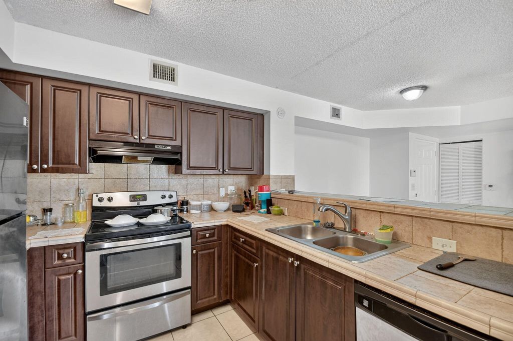 Photo of 1733 Village Boulevard #105, West Palm Beach, FL 33409 (MLS # B26047471)