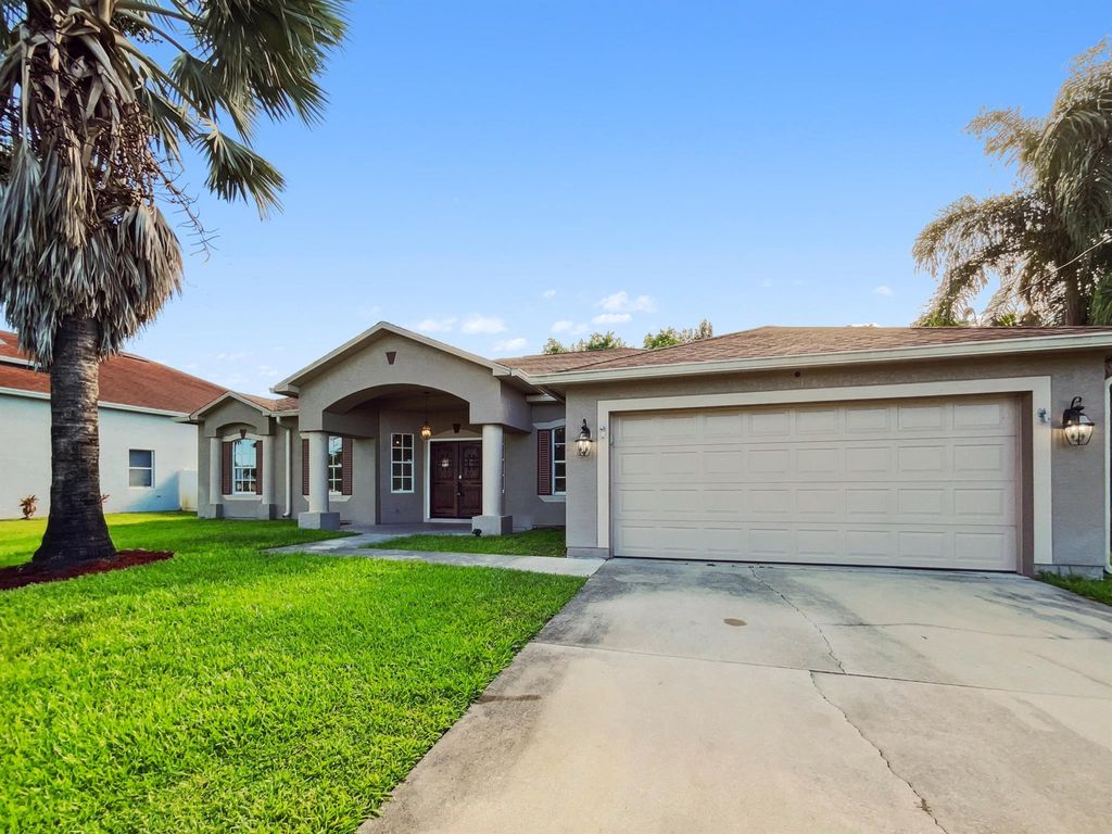Photo of 2081 SW Burlington Street, Port Saint Lucie, FL 34984 (MLS # R11103201)