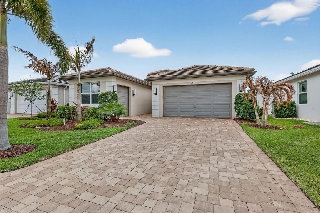 Photo of 11765 SW Poseidon Way, Port Saint Lucie, FL 34987 (MLS # B26010920)