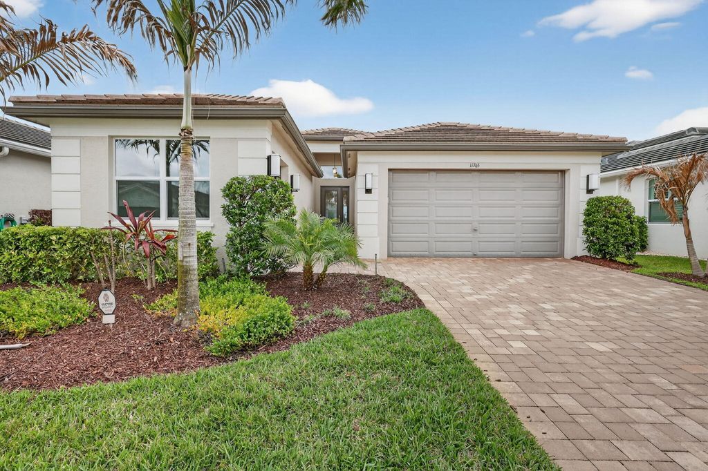 Photo of 11765 SW Poseidon Way, Port Saint Lucie, FL 34987 (MLS # B26010920)