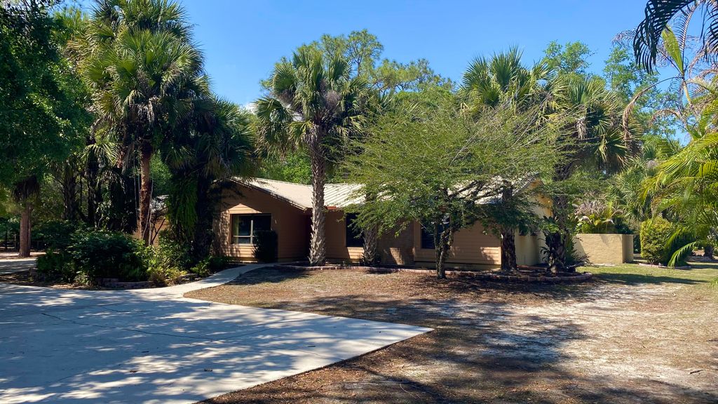 Photo of 12143 174th Pl Pl N, Jupiter, FL 33478 (MLS # B26007361)