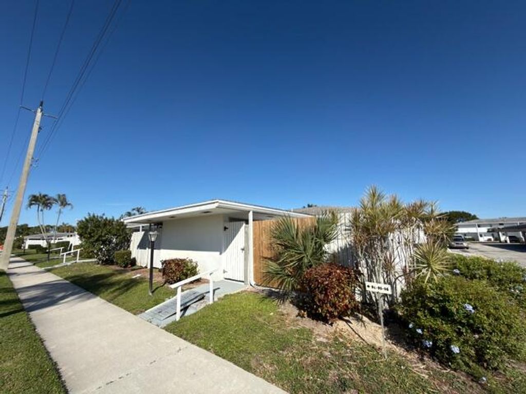 Photo of 96 East Court, Royal Palm Beach, FL 33411 (MLS # R11136587)