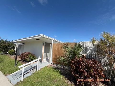 Photo of 96 East Court, Royal Palm Beach, FL 33411 (MLS # R11136587) Photo of 96 East Court, Royal Palm Beach, FL 33411 (MLS # R11136587)