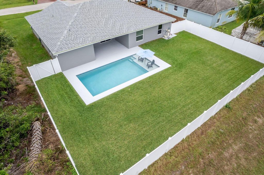 Photo of 4250 SW Jame Street, Port Saint Lucie, FL 34953 (MLS # R10946597)