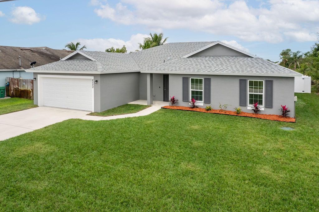 Photo of 4250 SW Jame Street, Port Saint Lucie, FL 34953 (MLS # R10946597)