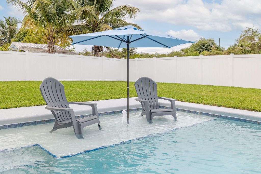 Photo of 4250 SW Jame Street, Port Saint Lucie, FL 34953 (MLS # R10946597)