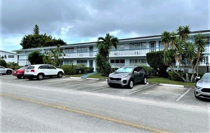 Very clean first floor 1/1 with a calm and peaceful view of the canal. Tile floors thru-out, new a/c in both the front and back of the condo. Updated kitchen appliances. Parking spot right out front. Active clubhouse with bus service inside and out of community.  Less then 4 miles to one of the best beach's in South Florida. Very close to I-95, Sawgrass Expressway and Florida Turnpike. The three Condo fee's are:  $154, $99.50 and $128.. Can rent after first year of ownership. The unit is being sold unfurnished.
