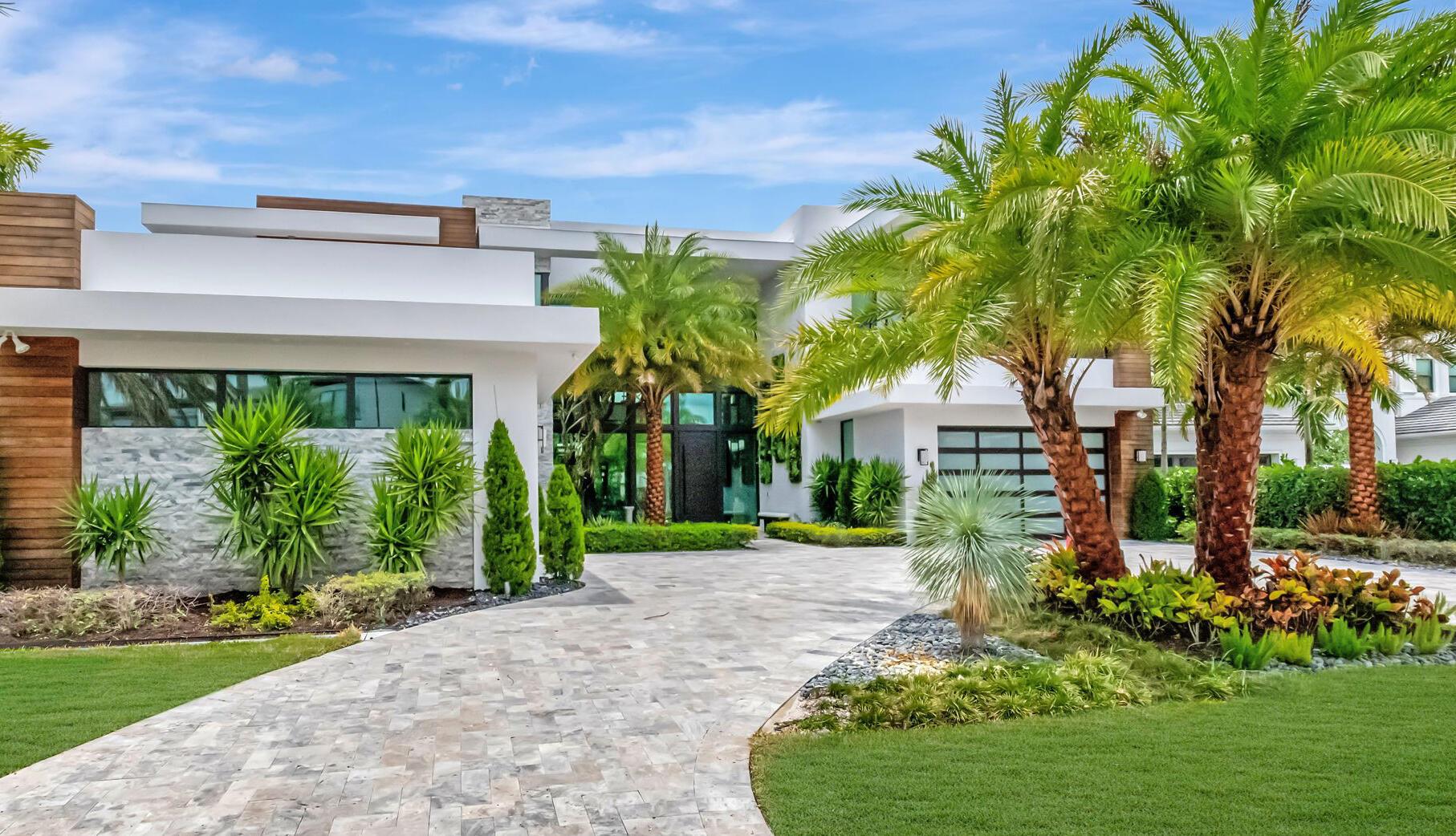 WELCOME TO THIS LAVISH MODERN LUXURY ESTATE LOCATED IN THE ENCLAVE SECTION OF PRESTIGIOUS BOCA BRIDGES. THIS DISTINGUISHED ''DALI'' CONTEMPORARY MASTERPIECE, ONLY SEVEN OF ITS KIND, SPANS 8,000 SQ.FT, WHERE MODERN ARCHITECTURE MEETS SOPHISTICATED ELEGANCE. THE COVETED ''DALI'' MODERN ESTATE IS LOCATED ON ONE OF THE LARGEST WATERFRONT LOTS IN BOCA BRIDGES! NESTLED INTO A PRIVATE CUL DE SAC. THIS OPEN CONCEPT FLOOR PLAN HAS SOARING CEILINGS AND WALLS OF SMART GLASS THAT SURROUND YOU WITH BREATHTAKING VIEWS. WITH OVER TWO MILLION DOLLARS IN AFTERMARKET CUSTOMIZED UPGRADES, YOU WILL BE BEDAZZLED BY THIS ULTIMATE SHOWCASE HOME DESIGNED BY NIKKI LEVY INTERIORS BOCA. BOASTING 6 BEDROOMS AND 7 1/2 LUXURIOUS BATHS THIS RESIDENCE IS A TESTAMENT TO LUXURY LIVING.