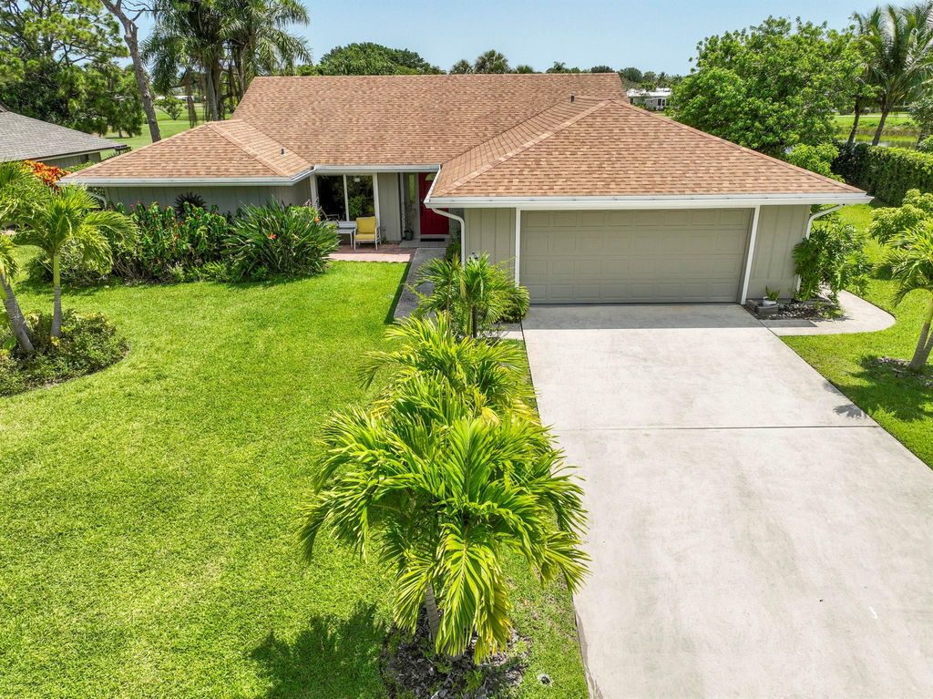 Photo of 7955 SE Trenton Avenue, Hobe Sound, FL 33455 (MLS # R11092374)