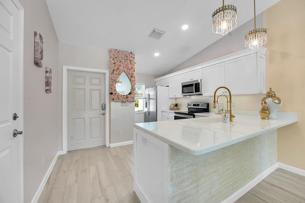 Photo of 5715 SE Pine Drive, Stuart, FL 34997 (MLS # R11101533)