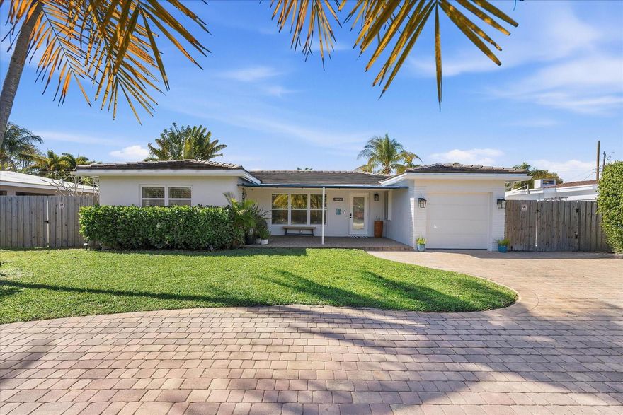 Located in the highly desirable Coral Heights, this beautifully updated 3bed/2bath home offers spacious living and a modern open design. The oversized chef’s kitchen is a true centerpiece, featuring stylish new cabinetry, quartz countertops, and a large island, perfect for entertaining. Outside you'll find a private backyard oasis showcasing a newly renovated travertine heated pool with deck and fresh Diamond Brite finish. Inside, both bathrooms have been tastefully renovated with LED mirrors, and the primary suite impresses with double vanities and a spa-like feel. Enjoy unbeatable convenience just 1.5 miles from the beach, close to popular restaurants, and a 25-minute (aprox) drive to the airport. This home truly must be seen in person to be fully appreciated. See the feature sheet.