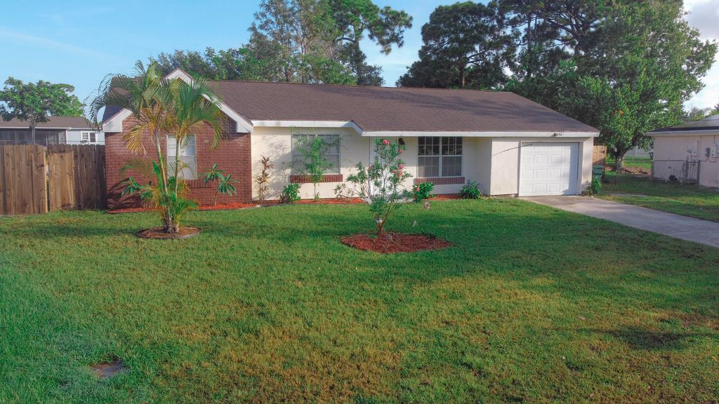 Photo of 1334 SE Larose Court Blvd, Port St Lucie, FL 34952 (MLS # R10814894)