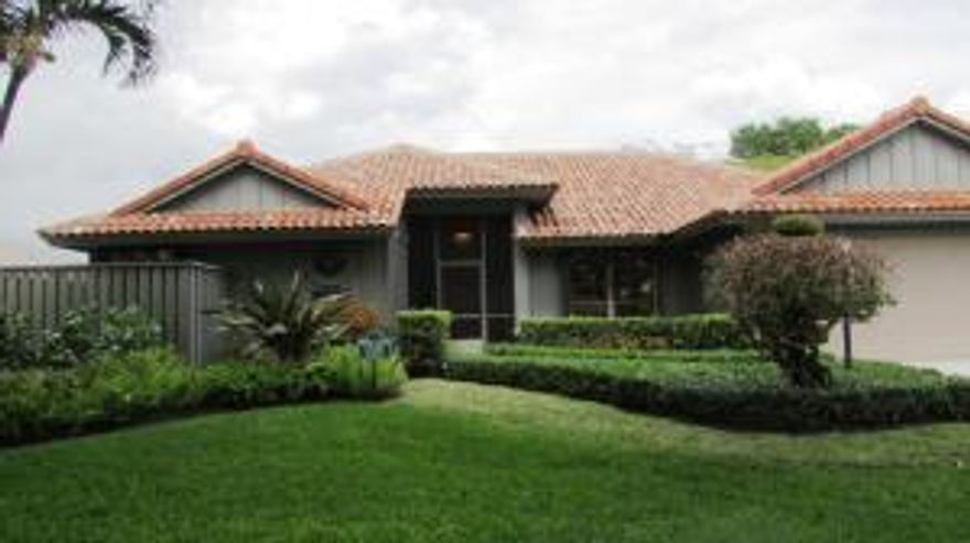 Located at the beginning of the Shores, this listing sits on the corner of a double dead end street. Once you enter the house you immediately see the views of the lake from the formal living room. Large island kitchen features custom wood cabinetry, built in pantry, breakfast nook and snack bar overlooking the family room and continuous lake views even while standing at the kitchen sink! Split bedrooms for privacy. Large master with ''reading lights where bed would be placed. Master bath has his and her walk in closets, separate tub with garden window, separate shower and lots of counter space and dual sinks. But if you like to entertain, having a screened lanai with heated pool bath is such a plus. Long lake views completes this picture. Come see and make this home yours!