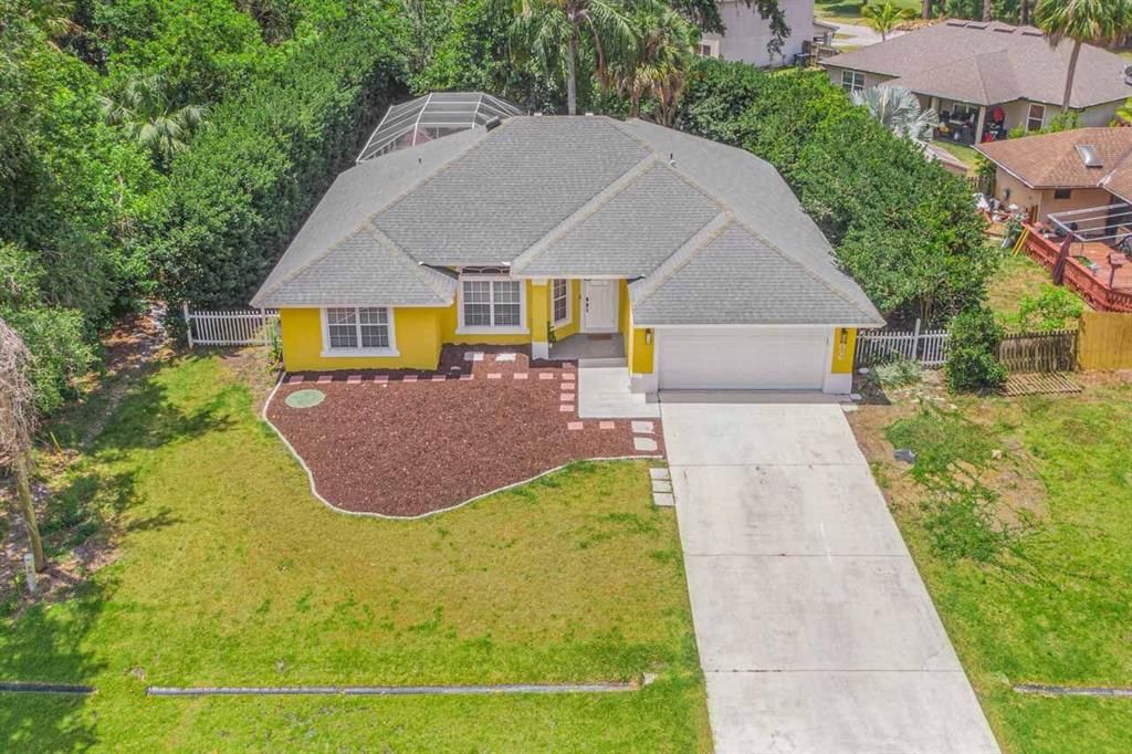 Photo of 2026 SW Import Drive, Port Saint Lucie, FL 34953 (MLS # R10720990)