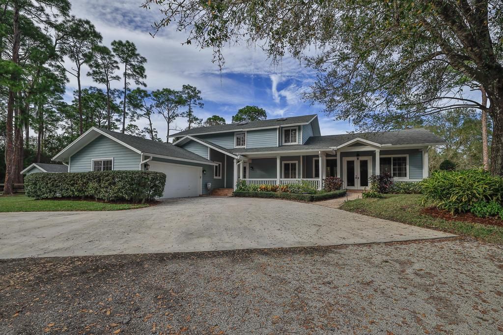 Photo of 6955 SW Woodbine Way, Palm City, FL 34990 (MLS # R10693657)