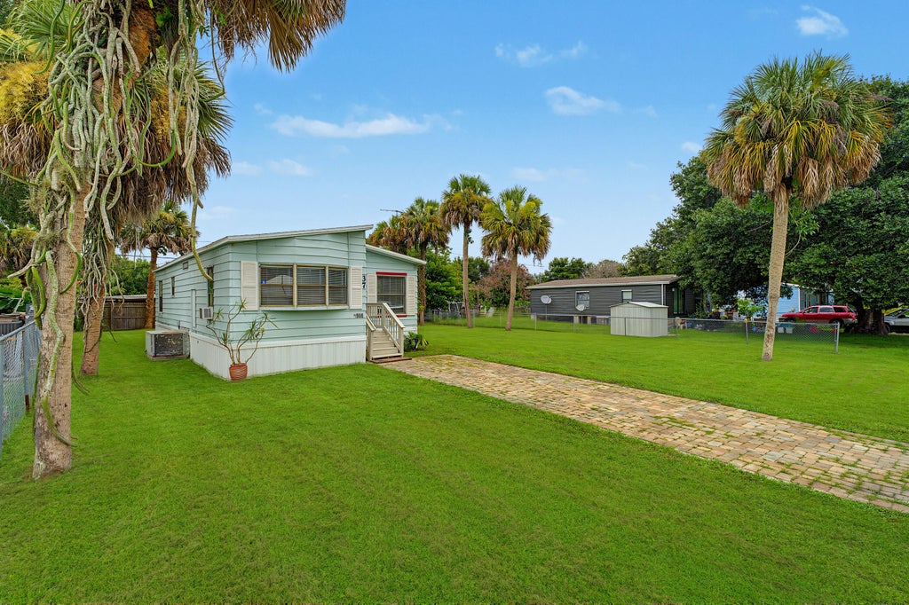 Photo of 4966 Deanna Lane, Fort Pierce, FL 34946 (MLS # B26060122)