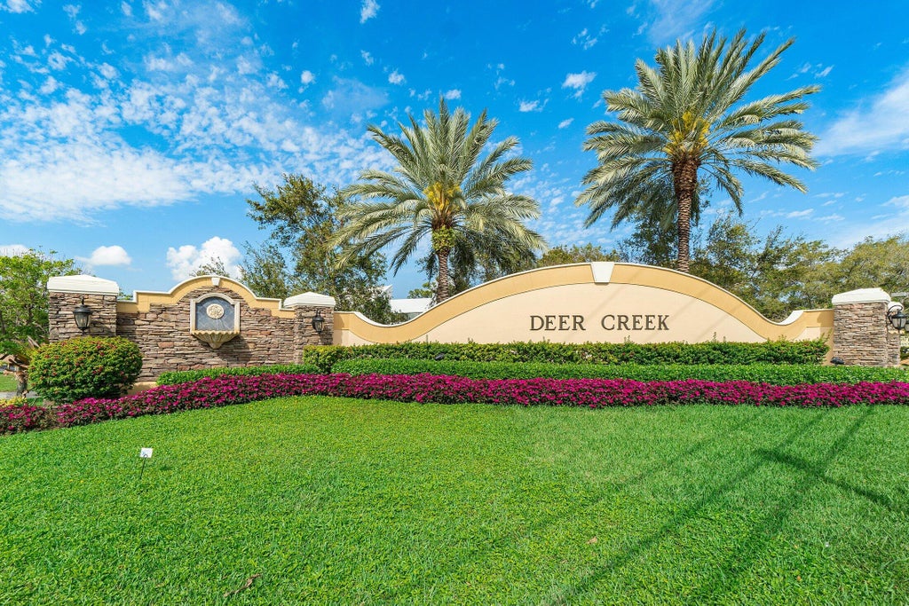 Photo of 2440 DEER CREEK COUNTRY CLUB Boulevard #405-C, Deerfield Beach, FL 33442 (MLS # B26084642)