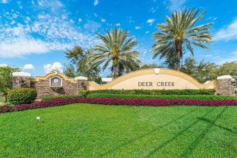 Photo of 2440 DEER CREEK COUNTRY CLUB Boulevard #405-C, Deerfield Beach, FL 33442 (MLS # B26084642)
