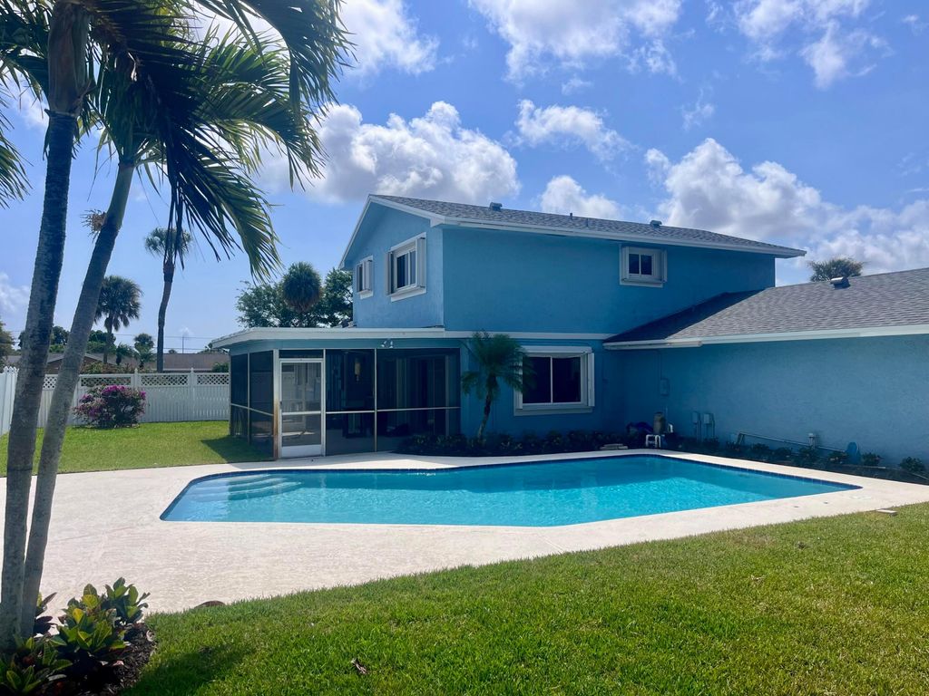 Photo of 3905 Flag Drive, Palm Beach Gardens, FL 33410 (MLS # B26020714)