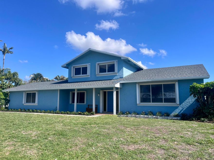 Built in 1976 and completely reimagined in 2026, 3905 Flag Dr sets a new standard for its non-HOA Palm Beach Gardens neighborhood. This beautifully renovated home offers over 2,200 sq ft of living space, 4 bedrooms, 2.5 bathrooms, an oversized two-car garage, plus room for you boat or RV, blending modern upgrades with timeless comfort. Step outside to your backyard oasis featuring a heated pool, screened patio and a spacious, fully fenced yard—perfect for relaxing or entertaining. With every detail thoughtfully updated inside and out, this move-in-ready home truly checks every box including a brand new shingle roof (with added 3rd nail) and complete hurricane protection for peace of mind and decreased insurance costs. No HOA and close to multiple parks and loads of shopping and dining.