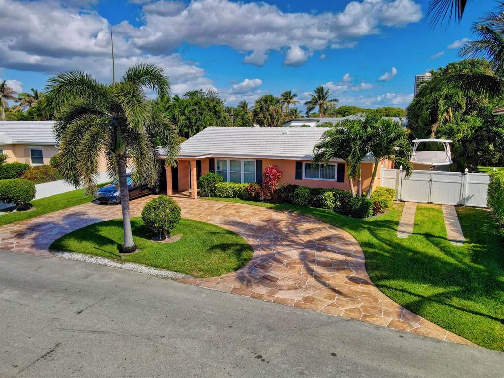 Photo of 121 Tacoma Lane, Palm Beach Shores, FL 33404 (MLS # R10705576)