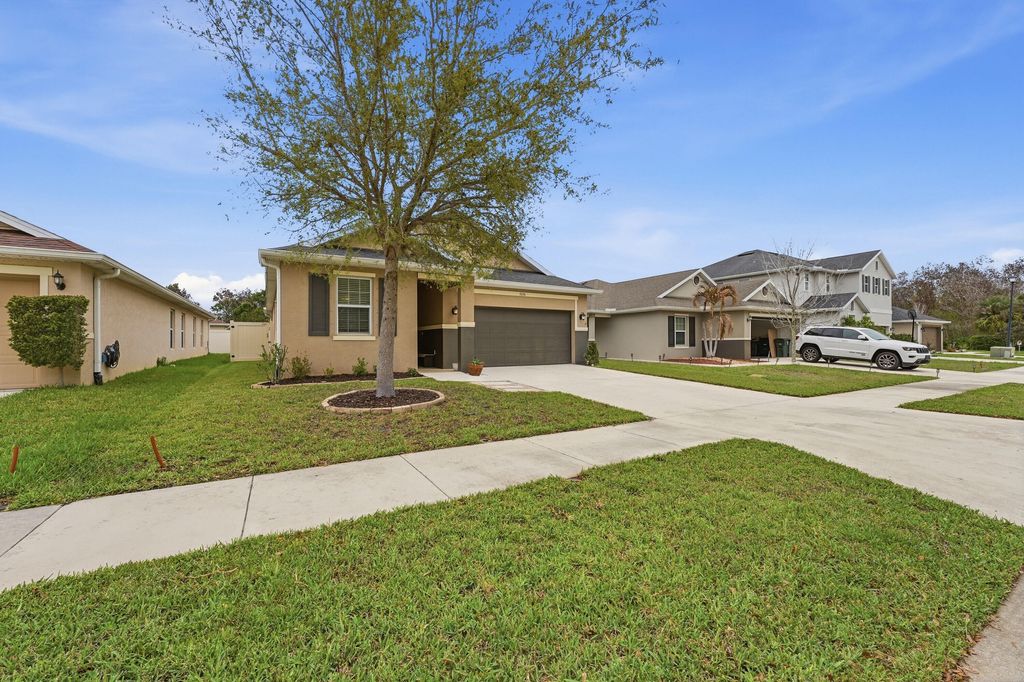 Photo of 5150 NW Pine Trail Circle, Port Saint Lucie, FL 34983 (MLS # B26004472)