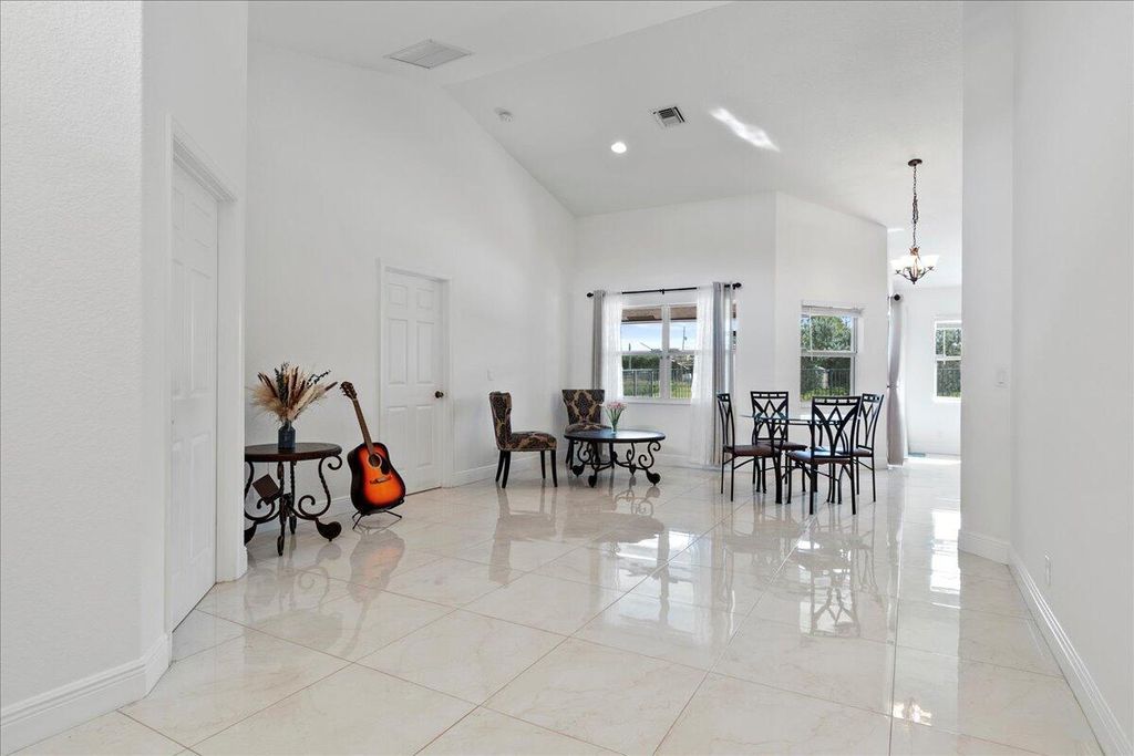 Photo of 13288 77th Place N, West Palm Beach, FL 33412 (MLS # R10993812)