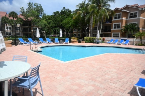 Tiny photo for 8721 Wiles Road #305, Coral Springs, FL 33067 (MLS # B26051203)