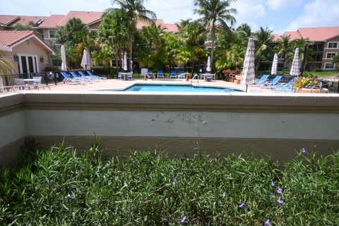 Tiny photo for 8721 Wiles Road #305, Coral Springs, FL 33067 (MLS # B26051203)