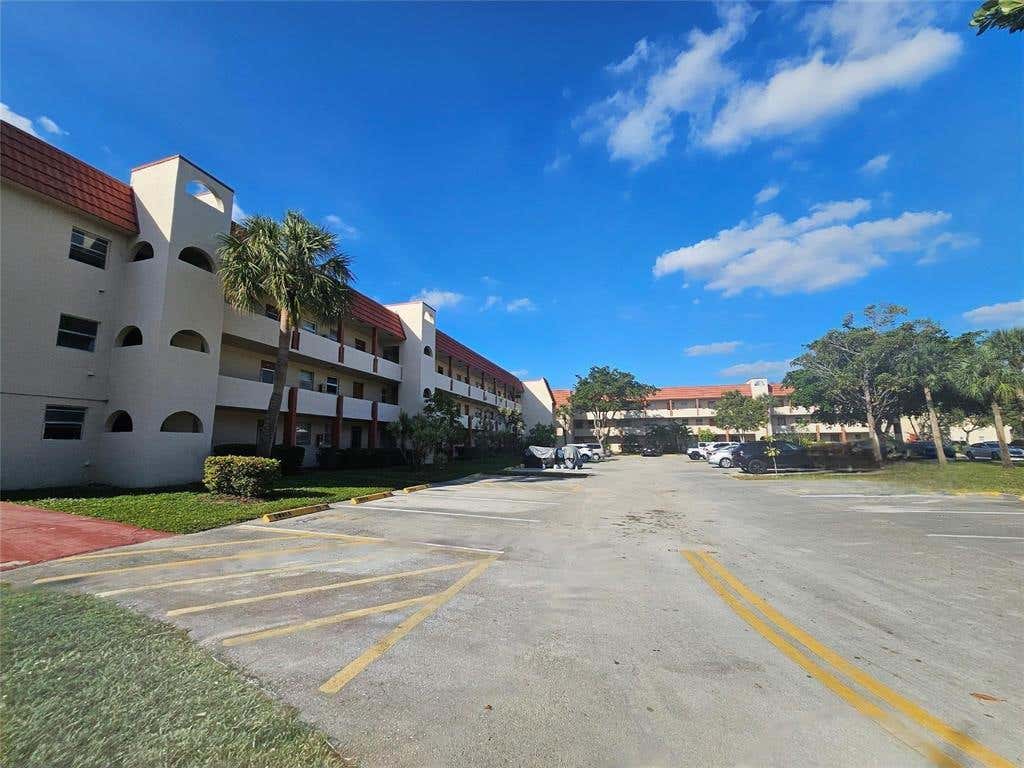 Photo of 3051 Sunrise Lakes Drive E #203, Sunrise, FL 33322 (MLS # B26064468)