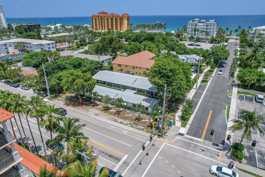 One of a kind location to build up to 55 ft providing direct ocean views. RM 25 zoning. 3/4 acre lot. A1A and Hillsboro Blvd provide thousands of cars passing by this landmark location with local traffic from Millionaire Mile and Boca Raton. 14 units with office. 13 studio units and 1 2 bedroom unit. All units have kitchens and closets. If you look around you will find plenty of high end developments surrounding The Royal Palm Hotel. Hotels nearby asking $600-$700/night. Plenty of walkability taking you to Oceans 234, Billabong, Island Water Sports, Kilwin's, Patio Bar Happy Hour, Embassy Suites, Kahuna's and the boardwalk on Deerfield Beach. Fantastic exposure and opportunity to build in an area that calls for luxury.