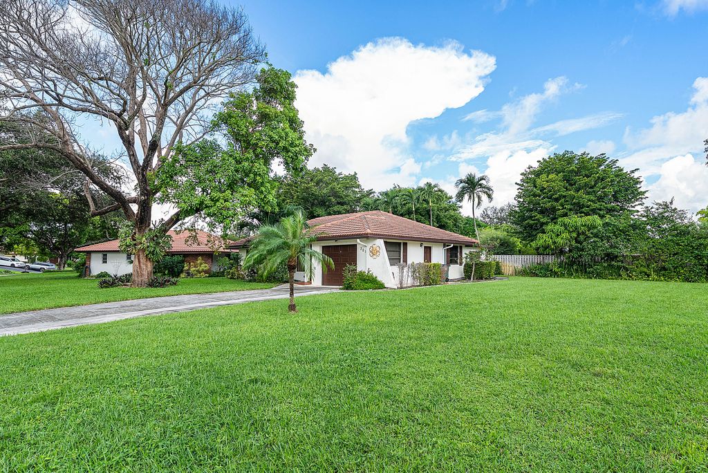 Photo of 301 NW 42nd Street, Boca Raton, FL 33431 (MLS # R11164484)