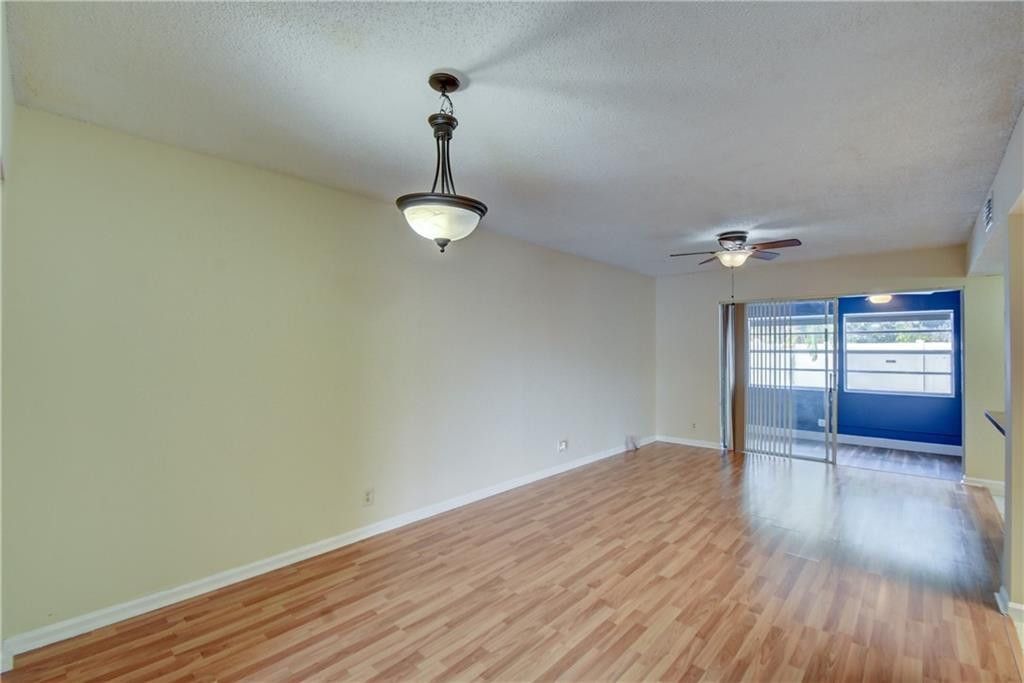 Photo of 1759 NW 80th Avenue #E, Margate, FL 33063 (MLS # F10549966)