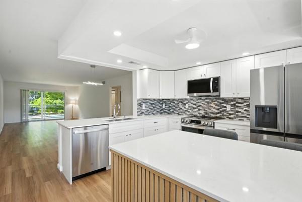 GORGEOUS! COMPLETELY REMODELED 2BEDROOM/2BATH Florida Room Overlooking Pool in Amazing Granada Village of Wynmoor. Large Spacious Layout! Open Kitchen with New Modern Cabinets + White Quartz Counter Tops with Stainless Steel Appliances. New Bathrooms! Smooth Ceiling, Unit has a Washer & Dryer inside. Full Service Community with restaurant, Clubhouse, community Room, Theatre, Business Center, Fitness Center, Pickleball, Golf course & Much more!! Close to Turnpike, I-95, Restaurants and Shopping.