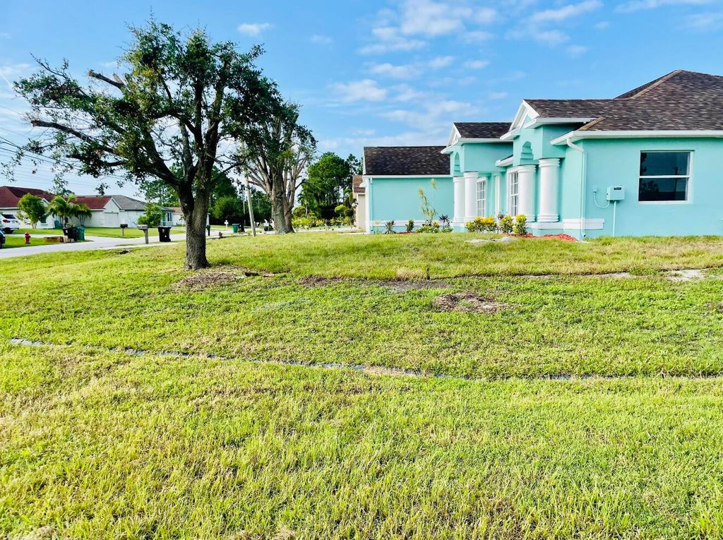 Photo of 2402 SW Brescia Street, Port Saint Lucie, FL 34953 (MLS # R11081079)