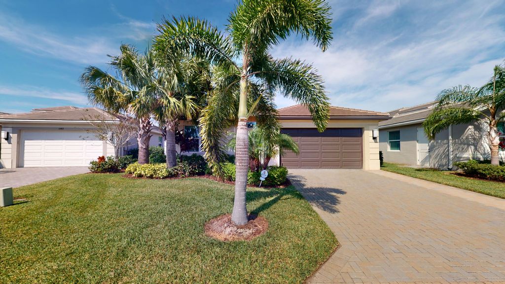 Photo of 11397 SW Half Moon Lake Lane, Port St Lucie, FL 34987 (MLS # R10870476)