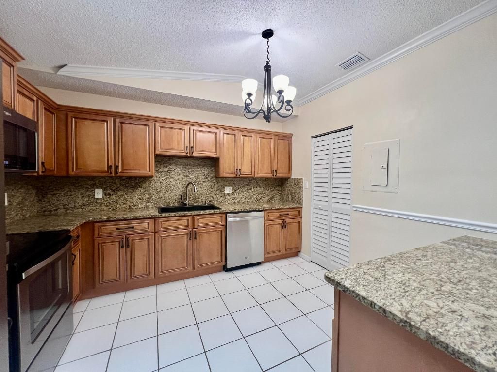 Photo of 1431 Captains Walk #17, Fort Pierce, FL 34950 (MLS # R11104951)
