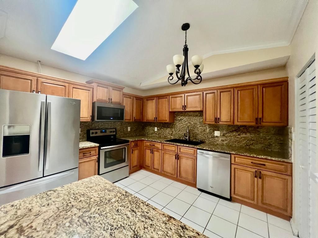 Photo of 1431 Captains Walk #17, Fort Pierce, FL 34950 (MLS # R11104951)