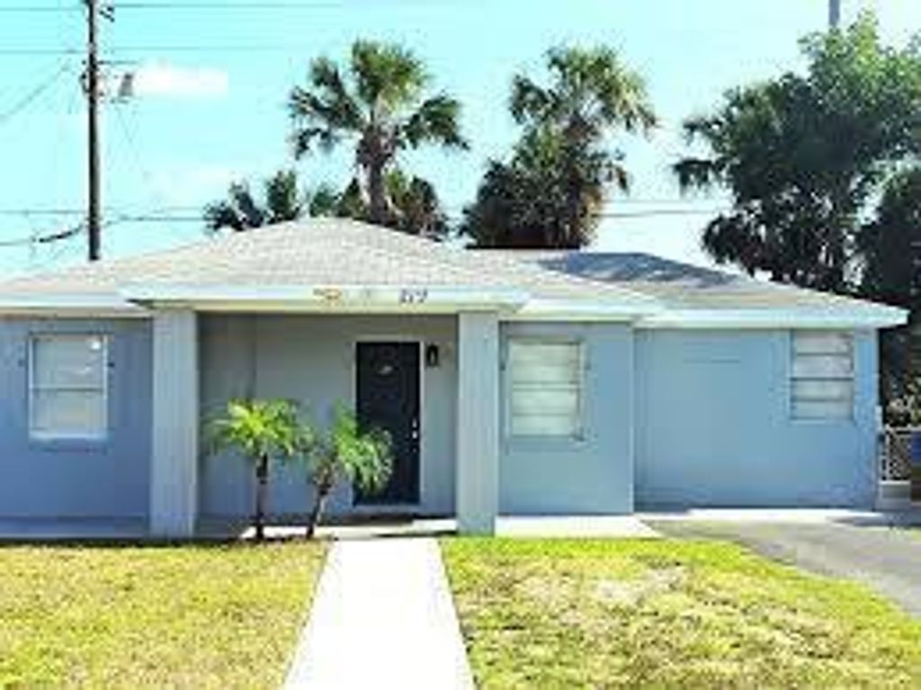 Photo of 219 W 27th Street, Riviera Beach, FL 33404 (MLS # R11098768)