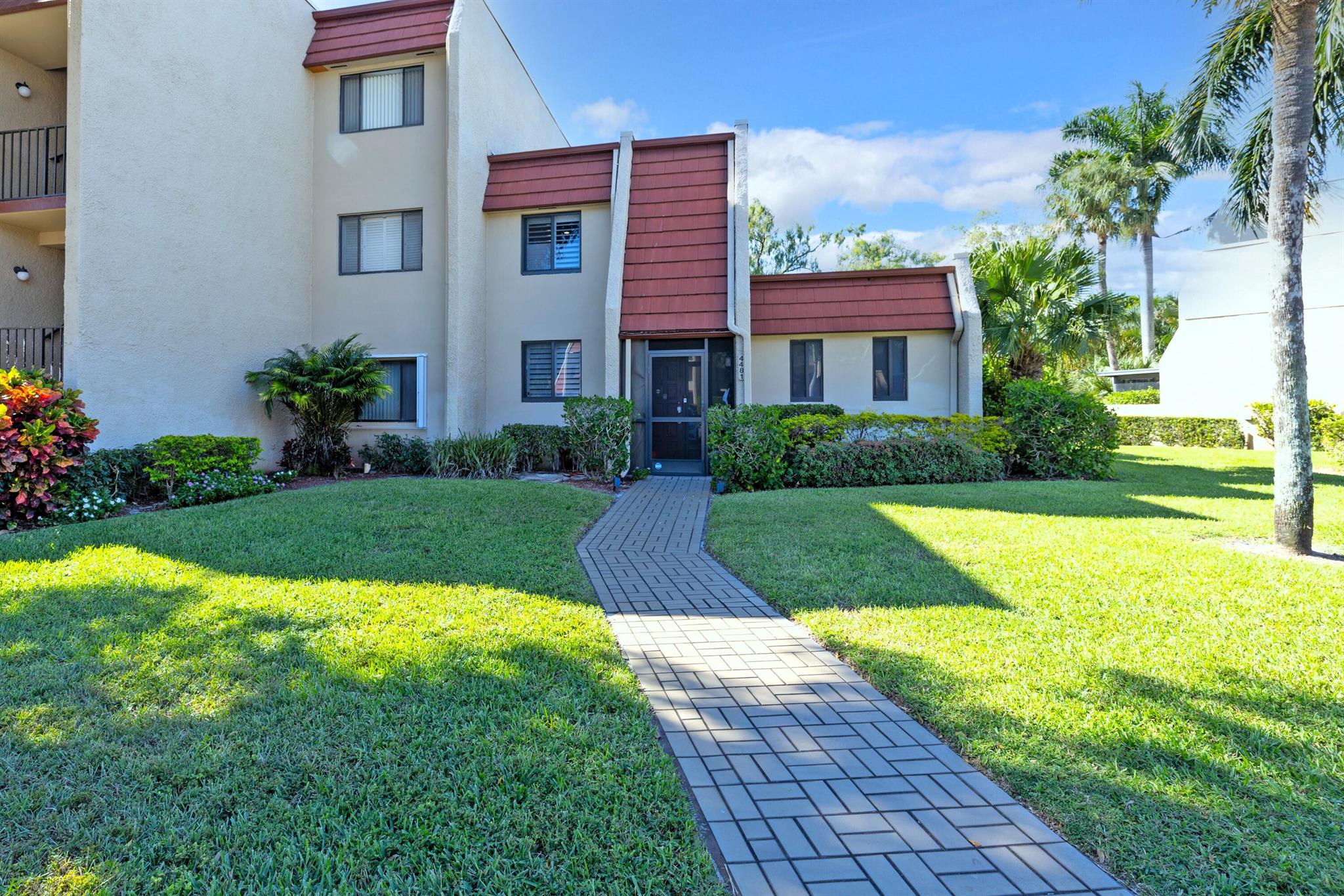STUNNING TOWNHOME, Fully remodeled, where modern elegance meets convenience. This turnkey home boasts a complete transformation, featuring new appliances, cabinets, all new bathrooms remodels, new electrical works, a tankless water-heater, hurricane impact windows and doors, and a beautiful community pool. Ready for your seasonal vacation in a beautiful gated community, 24/7 manned gate, with security patrol. Minutes away from restaurants, shopping areas, and roughly 10 miles from the beach! (Bikes and gym equipment do not convey)