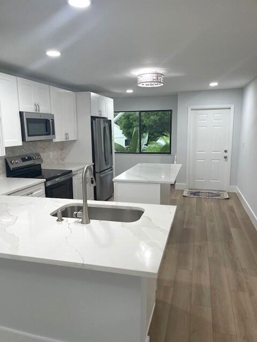 Photo of 4225 Gator Trace Avenue #F, Fort Pierce, FL 34982 (MLS # R11010556)