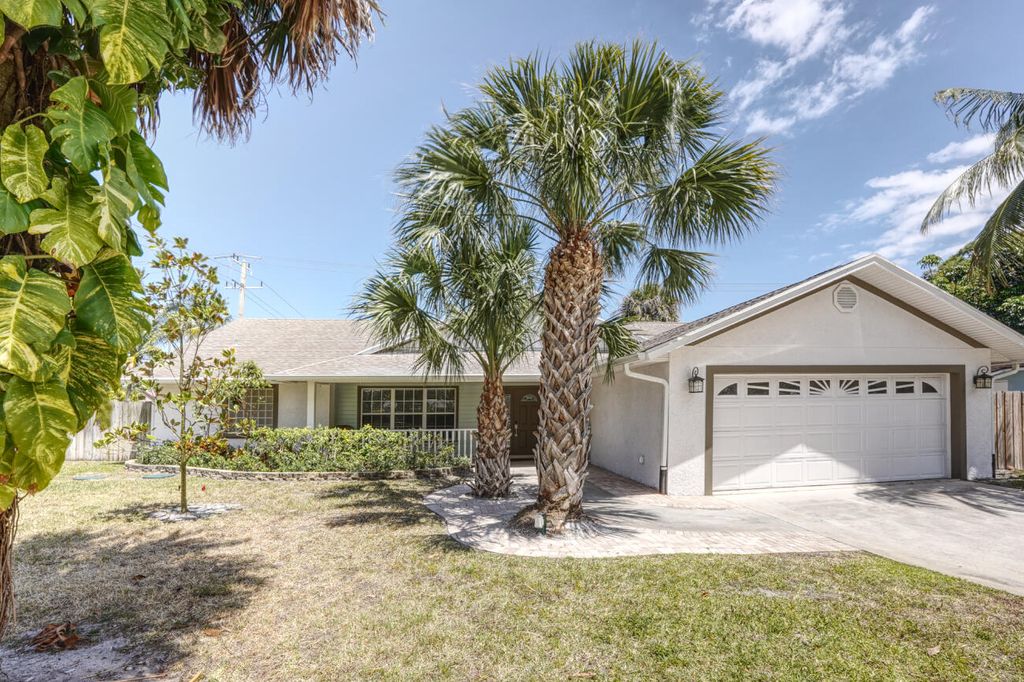 Photo of 701 SE Dolphin Drive, Stuart, FL 34996 (MLS # R10982628)