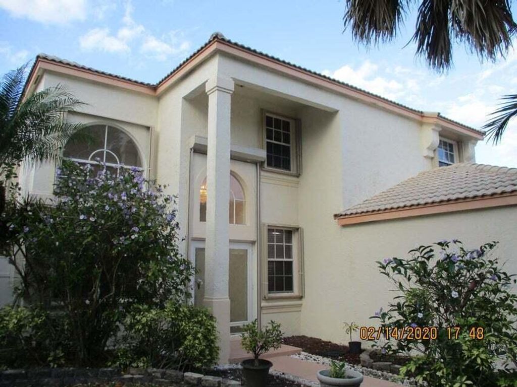 Photo of 7599 Ridgefield Lane, Lake Worth, FL 33467 (MLS # R11120882)