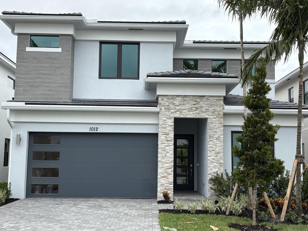 Photo of 1012 Raleigh Way, Wellington, FL 33414 (MLS # B26036955)